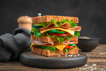 Sandwich with ham and fresh vegetables