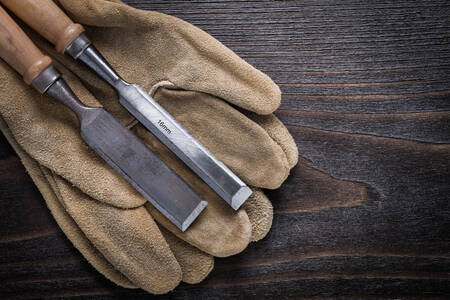 Wood chisel and gloves
