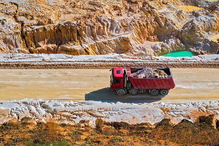 Red dump truck in a quarry