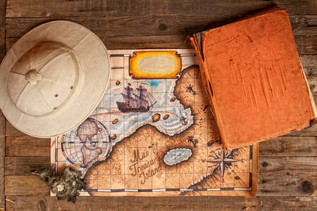 Helmet, map and book