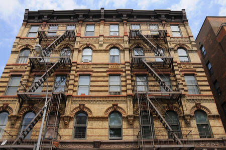 Building facade with fire escapes