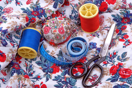 Sewing accessories on fabric