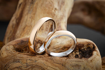 Wedding rings on a wooden stand
