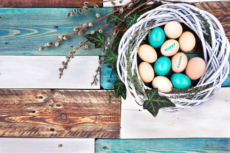 Easter eggs in a wreath on the table