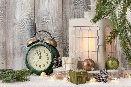 Christmas lantern and old clock