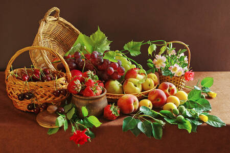 Fruits and berries in baskets