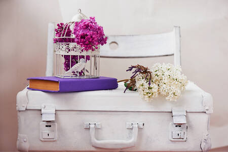 Lilac on a white suitcase