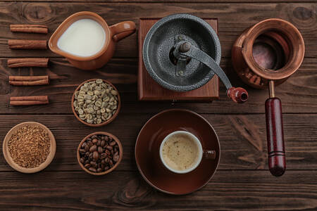 Coffee and accessories on wooden background