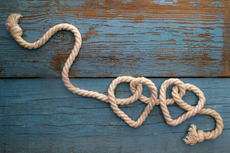 Rope hearts on a wooden table