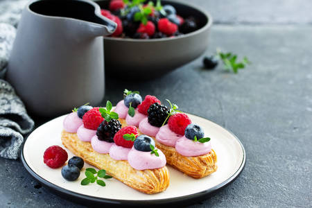Eclairs with berries