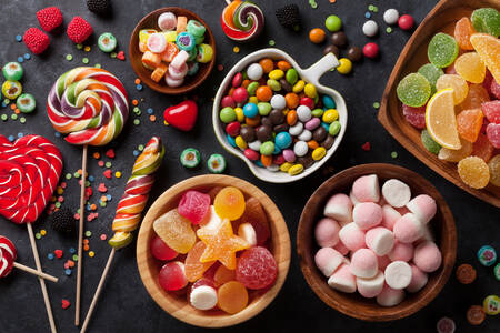 Assorted sweets in different dishes