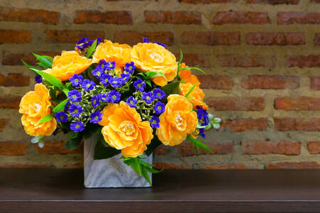 Bouquet of orange and blue flowers