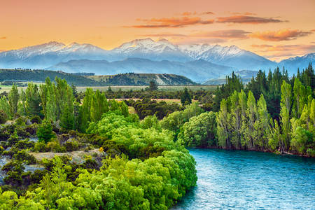 Sunset over the Kluta River with the Southern Alps in the background