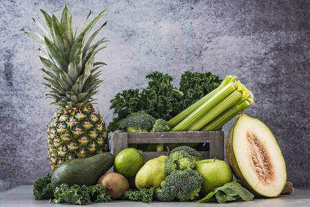 Fruits and vegetables on a gray background