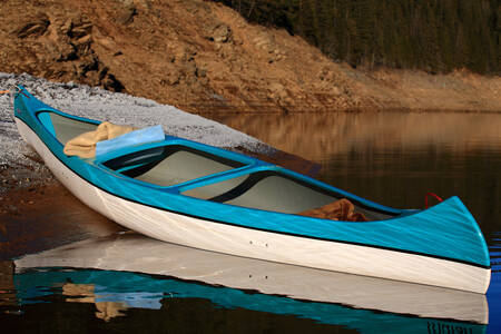 Canoe on the shore of Lake Belis