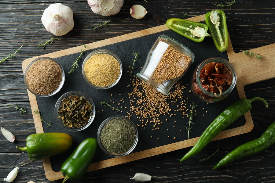 Spices on a black board
