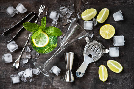Mojito with mint and bar accessories