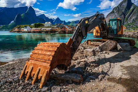 Bulldozer am Ufer