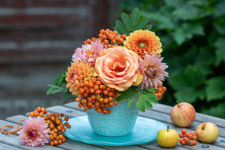 A bouquet of roses and dahlias