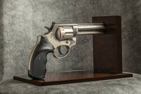 Revolver on a wooden stand
