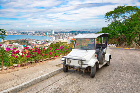 Taxi with the city of Mazatlan in the background
