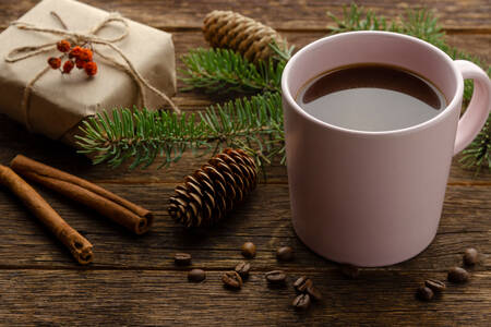 Coffee, spruce branch and gift