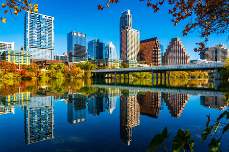 Reflection of the city of Austin in the river