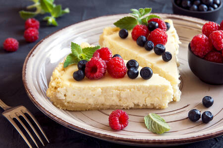 Cheesecake with berries on the table