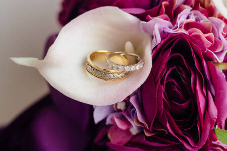 Wedding rings on a bouquet