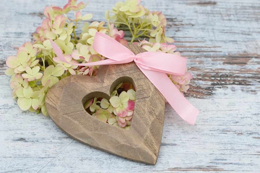 Wooden heart and flowers