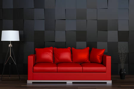 Black room with red sofa