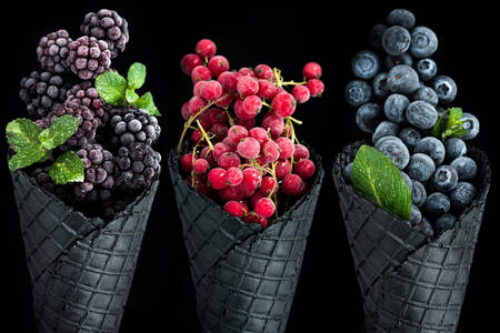 Frozen berries on a black background
