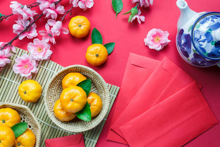Mandarinas y flores de sakura