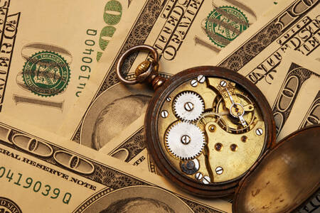 Pocket watch on banknotes