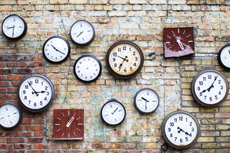 Collection of clocks on the wall
