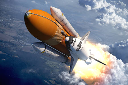 Space Shuttle über den Wolken