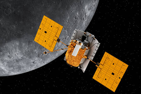 Space station orbiting the planet Mercury