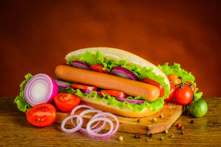 Hot dog with onions and vegetables