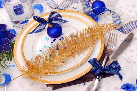 Christmas table in white and blue colors
