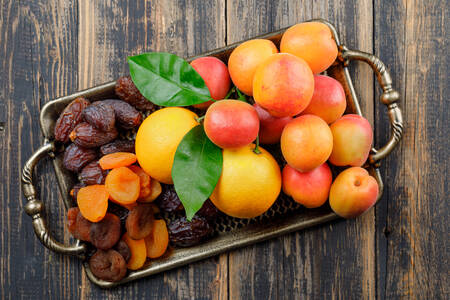 Ripe apricots, dates and dried apricots