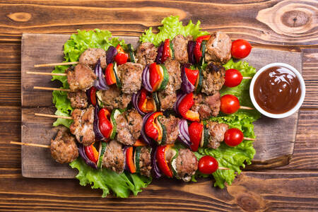 Shashlik on a wooden board