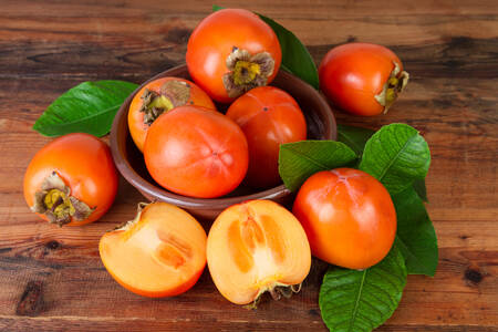 Persimmon on a wooden table