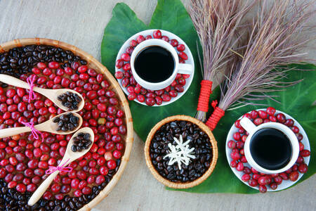 Coffee in cups and coffee beans