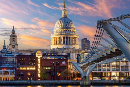 St. Paul's cathedral and Millennium bridge over Thames river