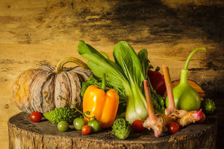 Fresh vegetables and fruits on a wooden table