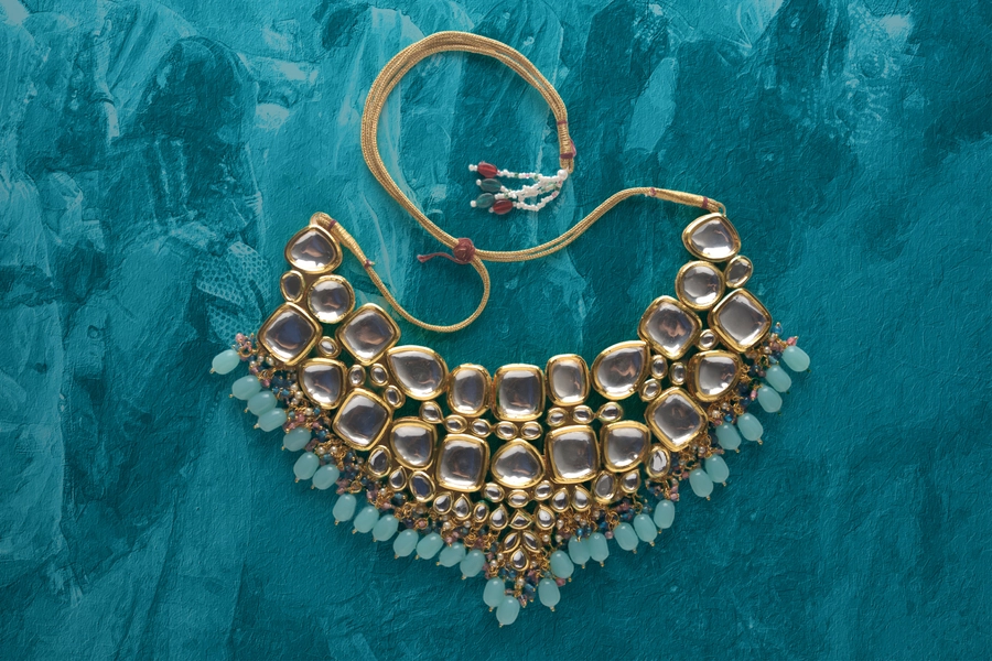 Necklace on a turquoise background