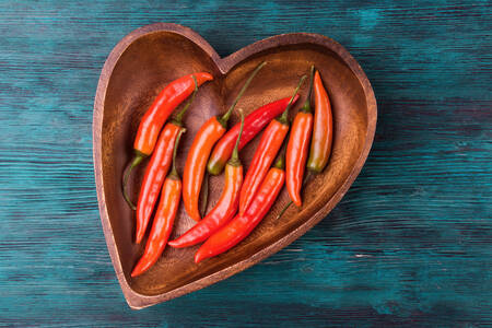 Chili peppers in a wooden plate
