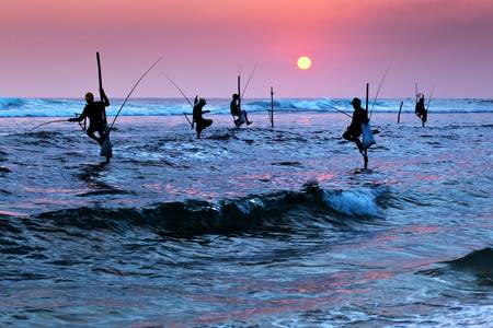 Rybárčenie pri západe slnka