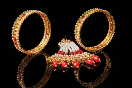 Gold bracelets and pendant