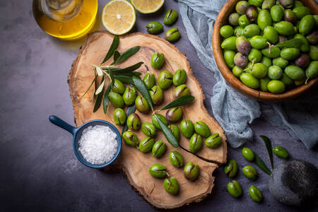 Green olives on a chalkboard